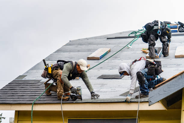 Professional Emergency Roof Repair technician working in Darien, CT